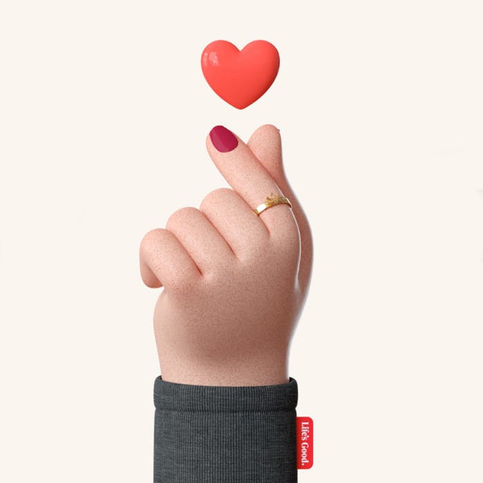 Animated Korean finger heart with animated heart.